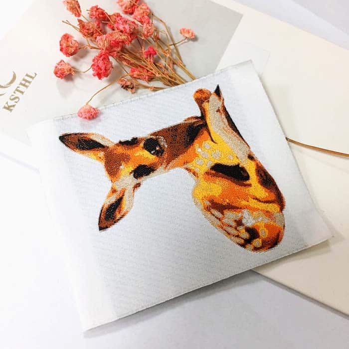 Custom high density giraffe animal woven clothing labels