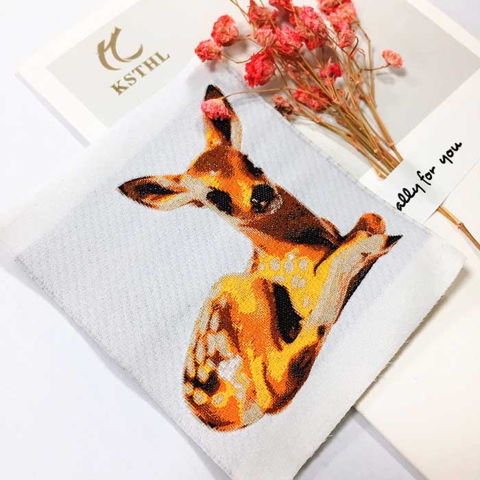 Custom high density giraffe animal woven clothing labels