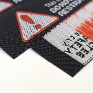 Warning label is woven tag polyester sewing clothing bags