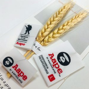 Update-2022 high density brand logo sew on name label woven private label tags for jeans