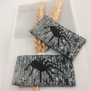 2023 new styles good custom garment label supplier cheap animal logo woven tags for clothing